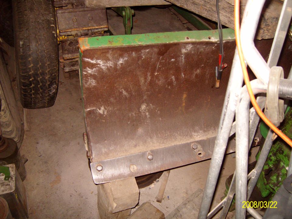 Dozer blade of John Deere MC crawler.