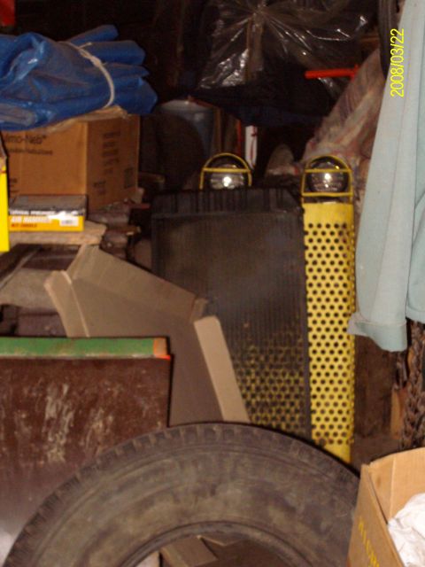 1988 Ford Bronco - Grill guard painted yellow with the lights on it.