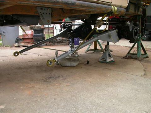 1990 Ford Bronco - Lowered radius arms to finish drilling bolt holes in frame.