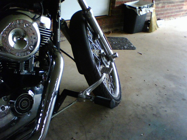 Motorcycle engine and front wheel on kickstand