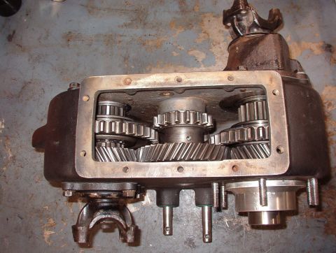 1975 Ford Bronco - 2WD High The front output sliding gear is centered (neutral) and can only move forward (front high). The rear output is engaged to the inpu…
