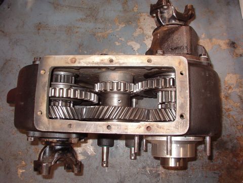 1975 Ford Bronco - 2WD Low The rear output sliding gear is full rearward (low-range). The pills prevent the front output shift rail from moving forward (to hi…