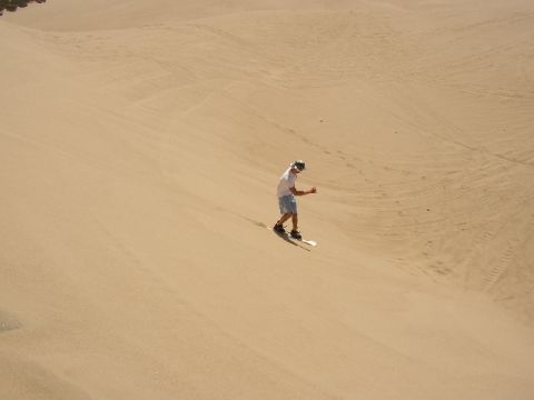 1989 Ford Bronco - Riding an old snow board in sand