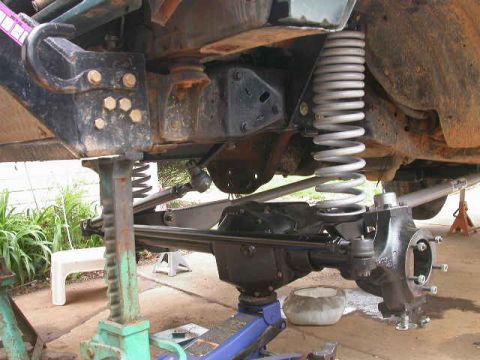 1990 Ford Bronco - Test fit coils to verify ride height. Brand new coils put in place for the first time, 20" compressed. I imagine that they'll settle to the…