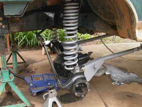 1990 Ford Bronco - Full droop, 26". Clearly they will droop more when the full weight of the axle is on them.
