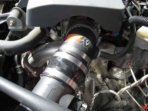 2004 Pontiac Grand Prix - Close-up of an engine bay, focusing on a K&N air intake system installation.