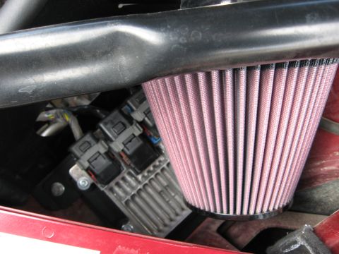 2004 Pontiac Grand Prix - Aftermarket air filter and engine control module visible in the engine bay.