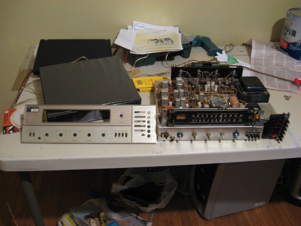 Vintage stereo receiver and tuner components on a table
