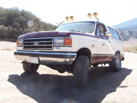 1990 Ford Bronco - This 1990 Ford Bronco has been modified with off-road tires and decorative smiley face lights.