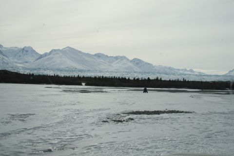 2003 Jeep TJ - ATV on frozen terrain with a vast glacial landscape and mountains beyond.