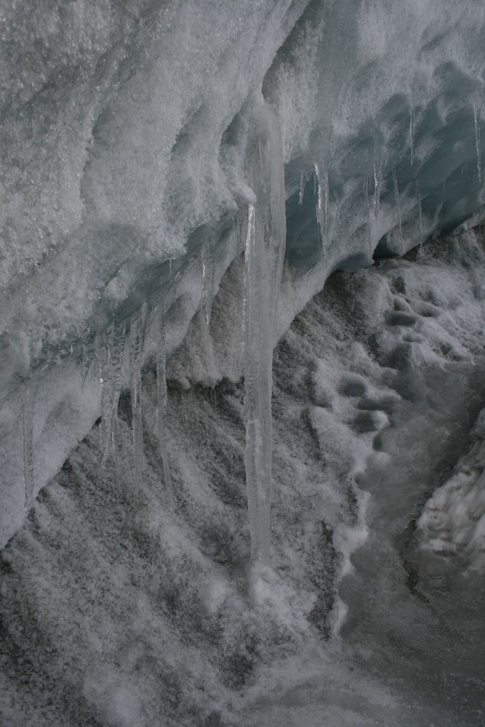 Ice formations with icicles hanging from an overhang