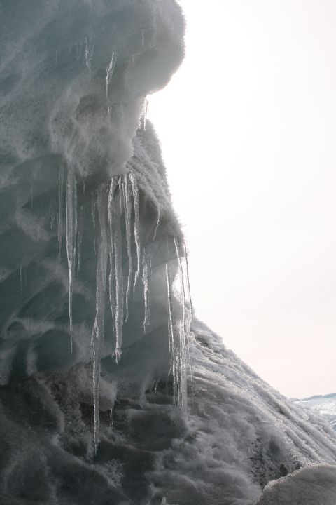 2003 Jeep TJ - Icicles drip from the edge of a glacier, indicating melting ice.