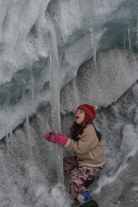 2003 Jeep TJ - Child exploring ice formations and icicles on a glacier.