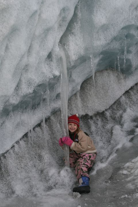 2003 Jeep TJ - A young explorer poses for a photo while navigating an icy cavern.