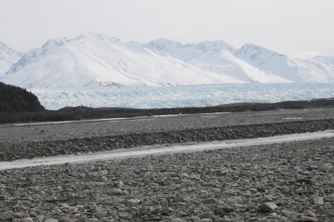 2003 Jeep TJ - A vast glacial landscape under a pale sky, with snow-covered mountains dominating the horizon.
