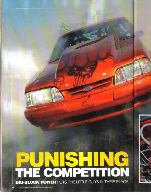 1990 Ford Mustang - This 1990 Ford Mustang features custom airbrushing on its hood, with the text 'Punishing the Competition' visible.
