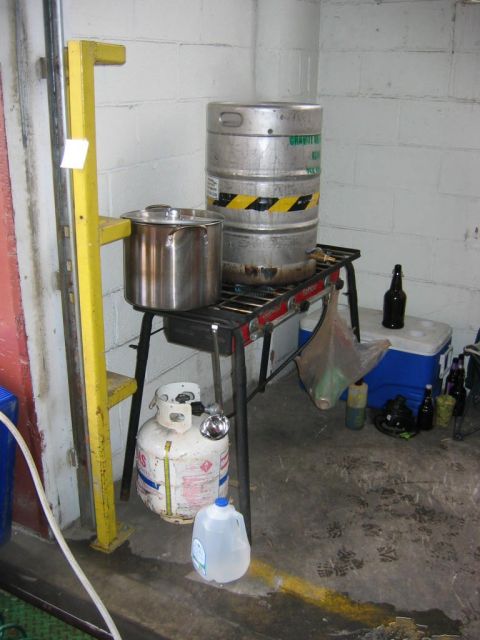 1985 Ford LTD Crown Victoria - Brewing setup with propane tank, kegs, and cooler. The album claims 1985 Ford Crown Victoria LTD.