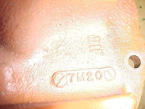 1968 Mercury Cougar - Cast metal part with visible casting numbers 7M200 and other unidentifiable markings.