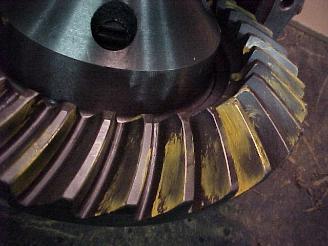 close-up of a differential ring gear with yellow marking compound