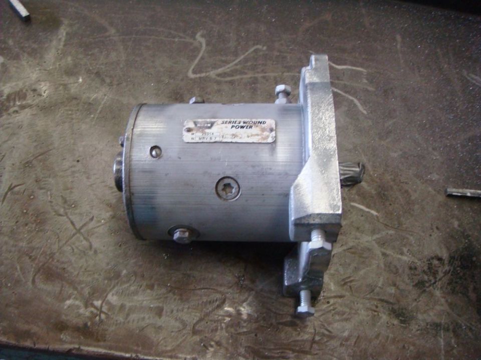 Silver starter motor with a label that says "SERIES WOUND POWER"