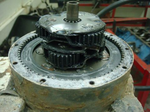 1996 Ford Bronco - Close-up of a damaged gear assembly, likely from a vehicle's drivetrain.