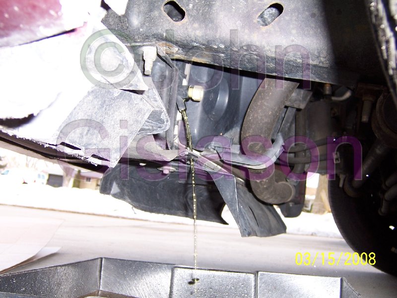 Draining Coolant from Radiator @ LF lower corner.