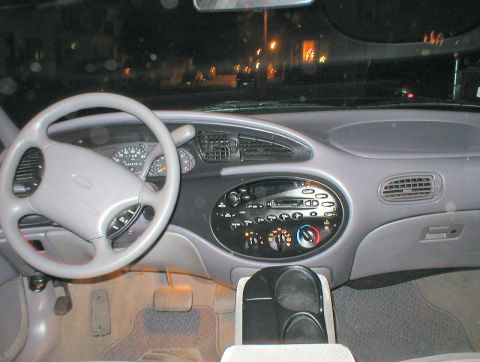 1998 Ford Taurus - Interior view of a 1998 Ford Taurus, highlighting the dashboard and driver's area.