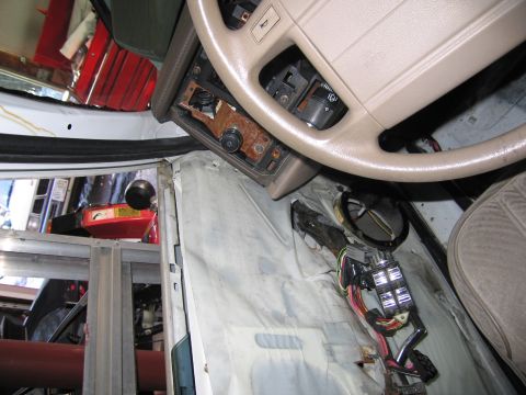 1991 Ford LTD Crown Victoria - The interior of a 1991 Ford Crown Victoria LTD shows significant disarray and exposed electrical components.