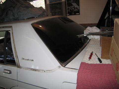 1991 Ford LTD Crown Victoria - Removing trim around the rear window of a 1991 Ford Crown Victoria LTD.