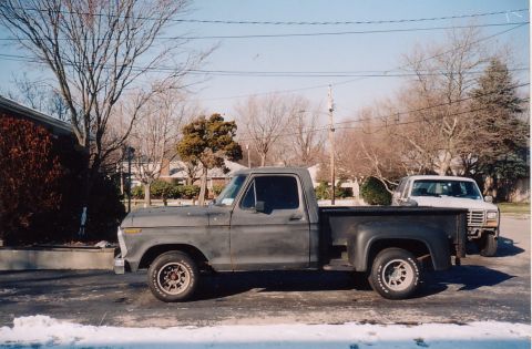 1994 Ford Bronco - 77 F100 w/302 full length headers custom interior never finshed the body , my 85 bronco in the background when just bought