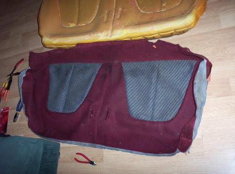 1995 Ford Probe - Car seat upholstery and foam padding are laid out on the floor with tools, suggesting an interior repair or redo.