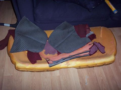 1995 Ford Probe - Car seat foam and fabric scraps are laid out on a wooden floor.