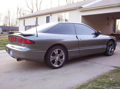 1995 Ford Probe - This 1995 Ford Probe is shown in a 3q-front view, a rear spoiler and custom wheels.