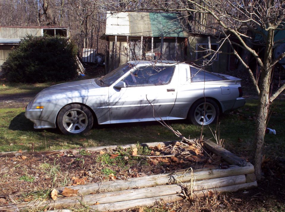 Silver coupe side view, 1995 Ford Probe