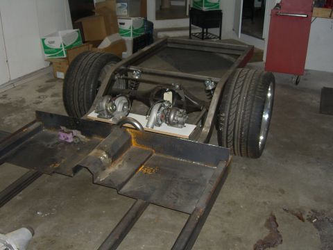 1964 Ford Ranchero - Custom chassis under construction, twin turbos and a rear axle assembly.