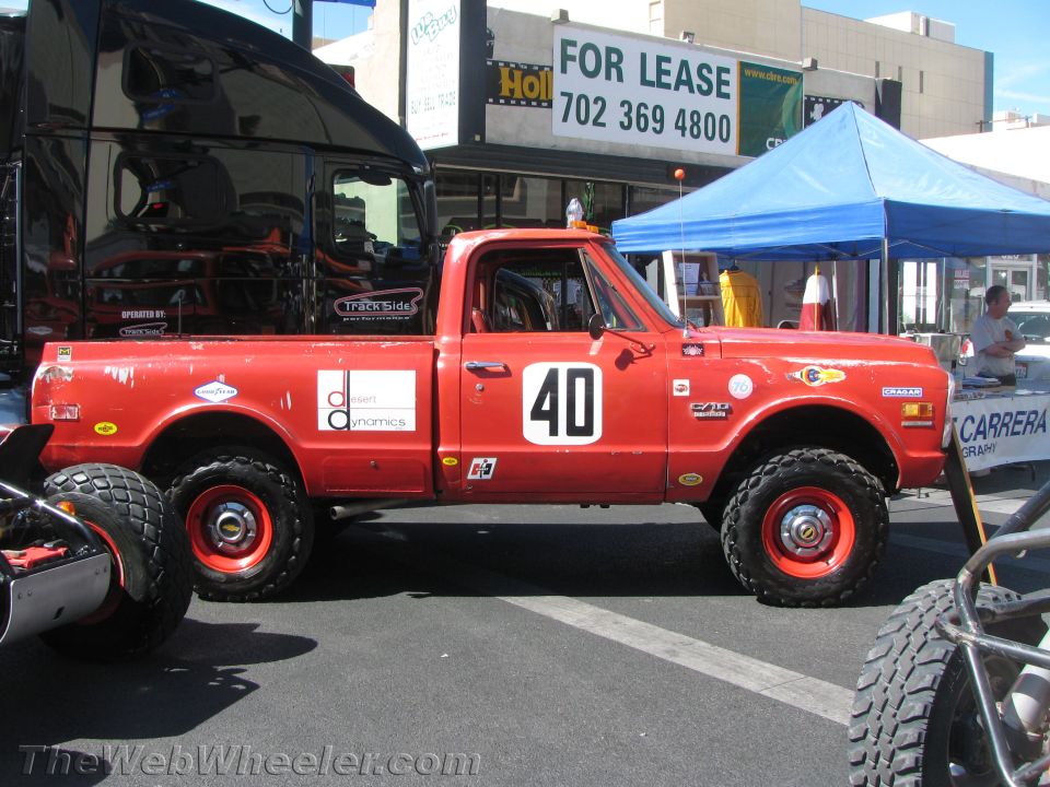 Red vintage Chevrolet pickup race truck number 40 parked side view