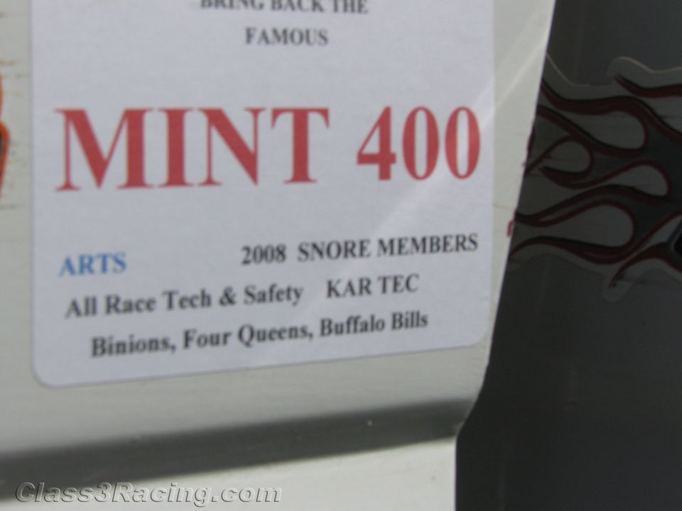 MINT 400 race event sponsor decal on a white vehicle body