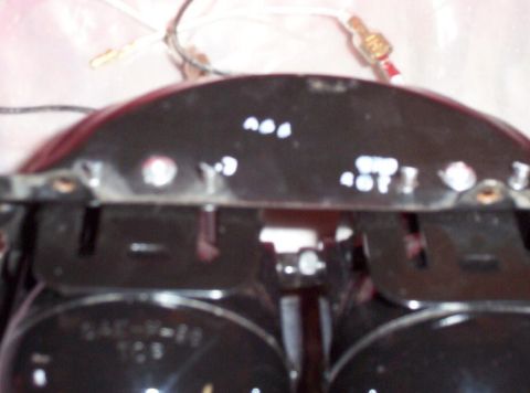 1995 Ford Probe - Two car headlights are visible, with electrical wiring connected to them.
