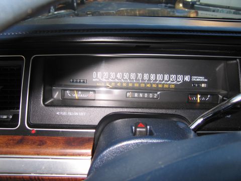 1991 Ford LTD Crown Victoria - Interior view of a 1991 Ford Crown Victoria LTD dashboard with gauges and gear selector visible.