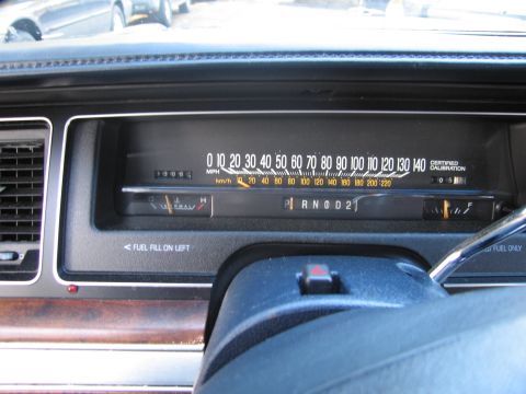 1991 Ford LTD Crown Victoria - Interior view of a vehicle's dashboard, showing the speedometer and fuel gauge.