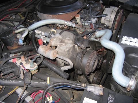 1991 Ford LTD Crown Victoria - Close-up view of an engine bay, showing various components and wiring.
