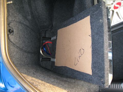 2007 Subaru Impreza - Custom audio installation in a car's trunk, with wiring and a speaker enclosure template visible.