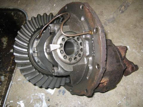 1989 Ford Bronco - Close-up of a vehicle differential carrier and ring gear assembly.