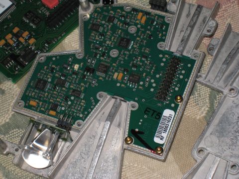 2007 Subaru Impreza - Close-up view of electronic circuit boards with various components and metal heatsinks.