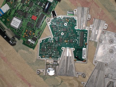 2007 Subaru Impreza - Close-up view of disassembled electronic circuit boards, showing intricate components and wiring.