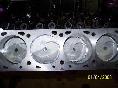 1995 Ford Bronco - Close-up view of engine cylinder heads and pistons, with a date stamp of 01/04/2008.