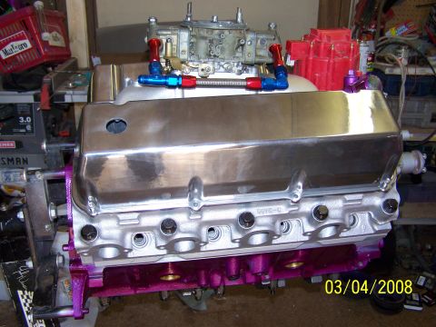 1995 Ford Bronco - Engine components are visible on a workbench, with a date stamp of 03/04/2008.