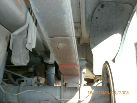 1991 Ford Bronco - Underside view of a 1991 Ford Bronco, highlighting its rear suspension components.