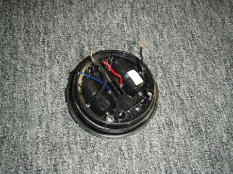 1992 Ford Bronco - close up of the mirror motor removed from the housing.