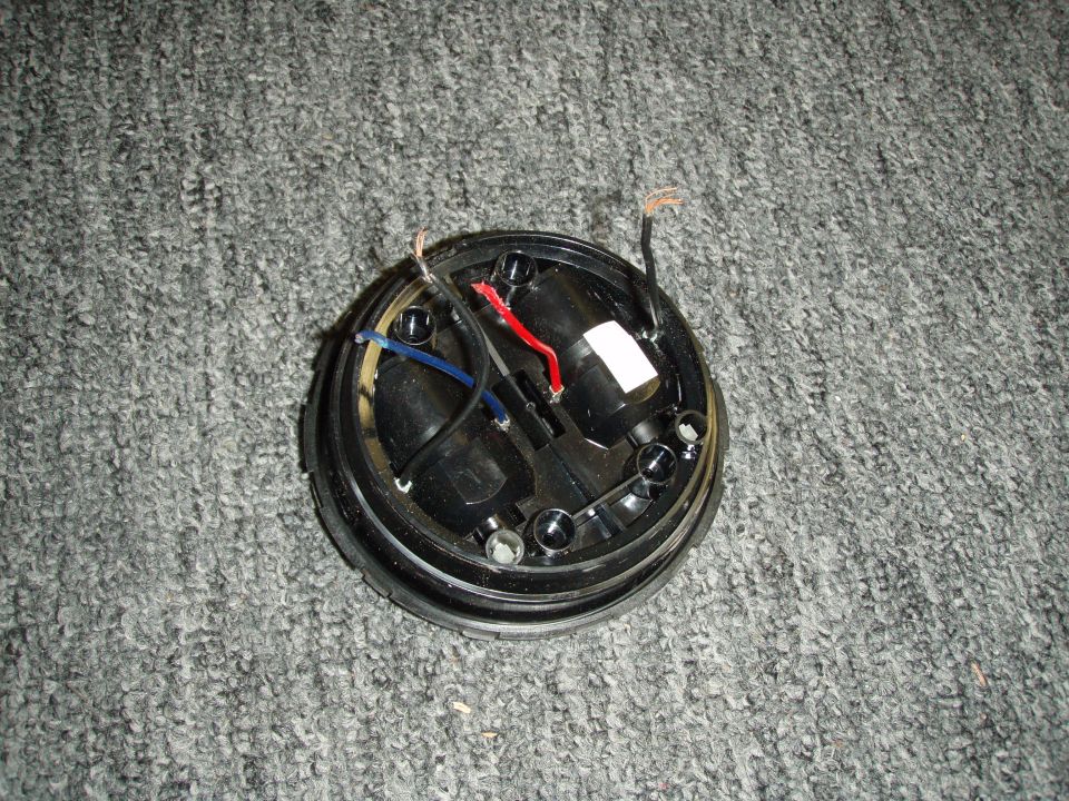 close up of the mirror motor removed from the housing.